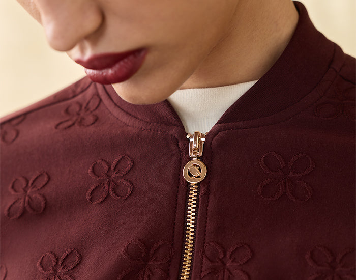 Gold zipper with Q puller